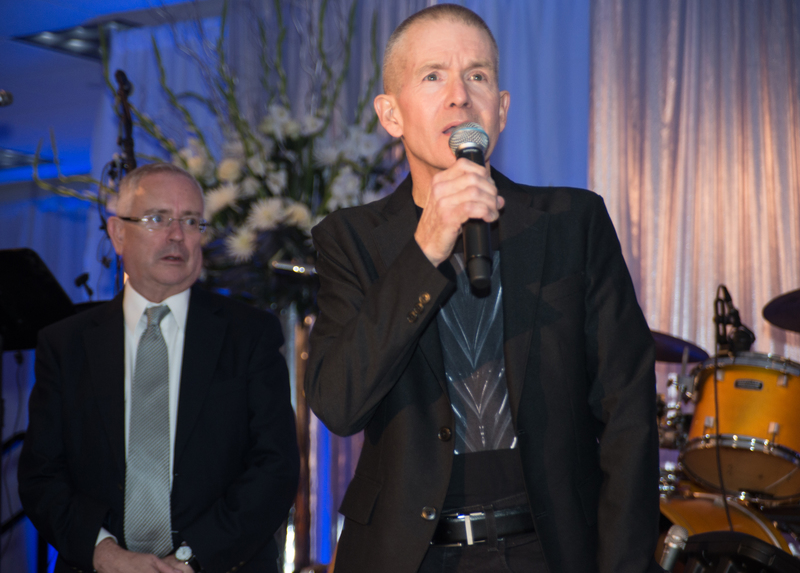 CAMP Rehoboth founders Steve Elkins, left and Murray Archibald thank the committee that created the weekend long celebration. BY DENY HOWETH